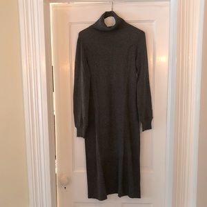 Soft knit, turtleneck dress with cable knit detail.